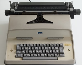 IBM Model D vintage electric typewriter in original grey color, Switzerland (c. 1970)