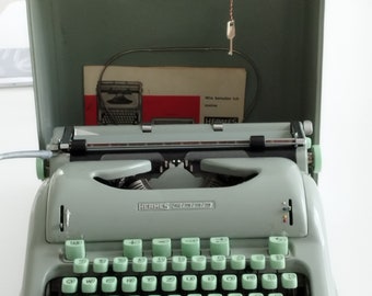 Hermes 3000 Portable Typewriter in great working condition with matching original hard case and parts, Switzerland (c. 1950)
