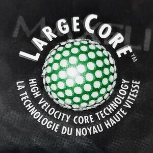May include: A black and white logo with the text "Large Core" in a circle. The text "High Velocity Core Technology" is written in a circle around the logo. The text "La Technologie du Noyau Haute Vitesse" is written in a circle around the text "High Velocity Core Technology".