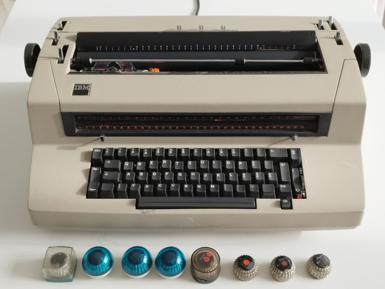 IBM Selectric II Golf ball vintage electric typewriter in original grey color with 8 extra type balls, Switzerland c. 1970 image 1