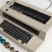 IBM Selectric II Golf ball vintage electric typewriter in original grey color with 8 extra type balls, Switzerland c. 1970 image 2