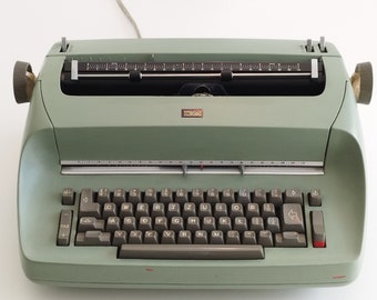 IBM Selectric "Golf ball" vintage electric typewriter in original emerald green color, Switzerland (c. 1960)