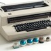 IBM Selectric II Golf ball vintage electric typewriter in original grey color with 8 extra type balls, Switzerland c. 1970 image 5