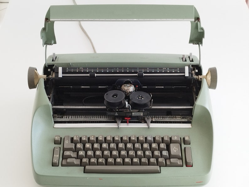 IBM Selectric golf Ball Vintage Electric Typewriter in Original Emerald Green Color, Switzerland