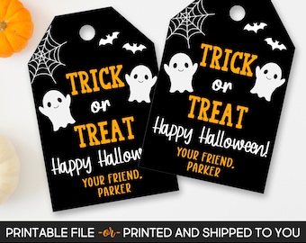 May include: Two black Halloween gift tags with orange and white text that reads "Trick or Treat" and "Happy Halloween!" with ghost and bat graphics. The tags are personalized with the name "Parker".