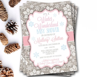 May include: A pink and blue baby shower invitation with a winter wonderland theme. The invitation features a white snowflake pattern on a woodgrain background. The text reads "It's a Winter Wonderland Baby Shower in honor of Mallory Sutton".
