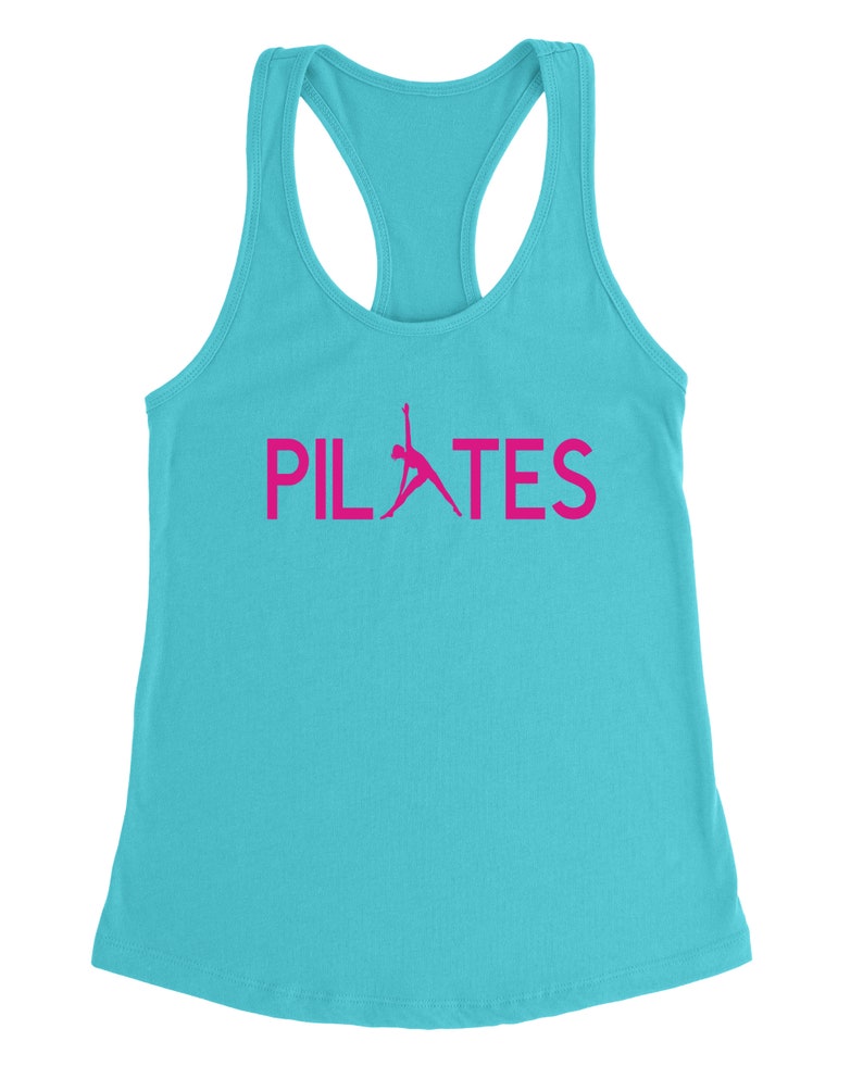 May include: A turquoise tank top with a pink silhouette of a person doing pilates and the word "PILATES" in pink letters.