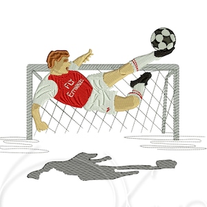 May include: A soccer player in a red and white jersey with "FLY EMIRATES" printed on the front kicks a soccer ball into a goal. The player is in mid-air and the ball is in the air.