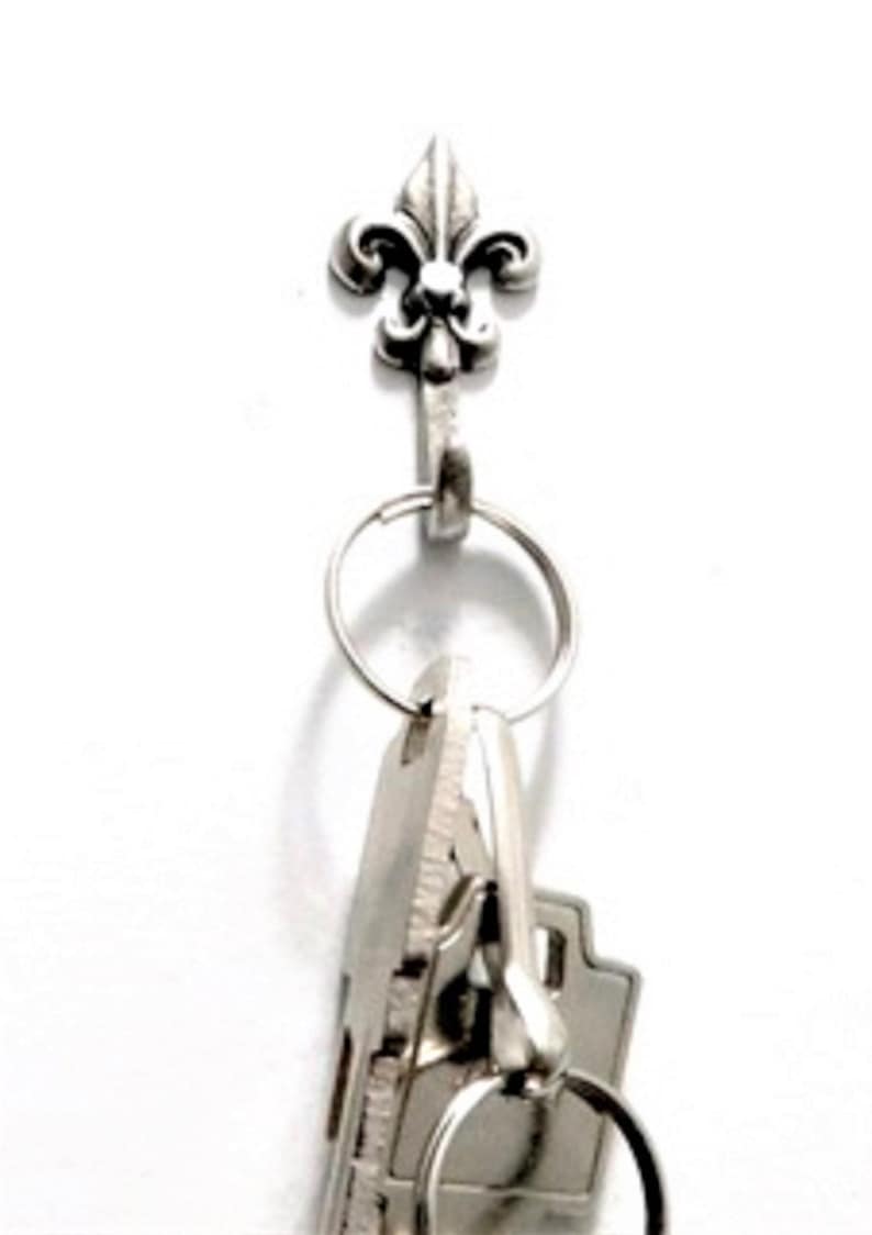Mini silver fleur de lis hooks hanging keys
