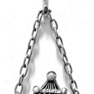 Mini silver fleur de lis hooks hanging a photo frame