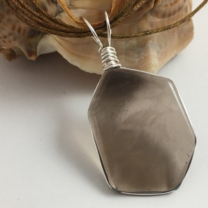 Smokey Quartz polished slice pendant wrapped in non tarnish silver plated wire