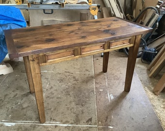 Country cottage kitchen table made using reclaimed old pine