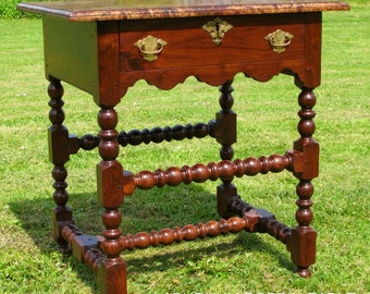 Late 17th century style bobbin side table.with Burr elm top.
