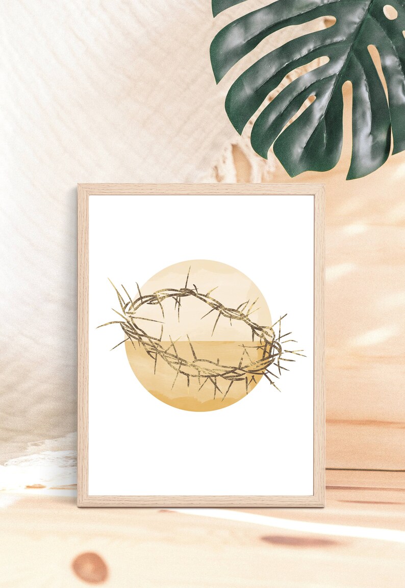 May include: A framed print of a watercolor illustration of a crown of thorns on a yellow and white circle background.