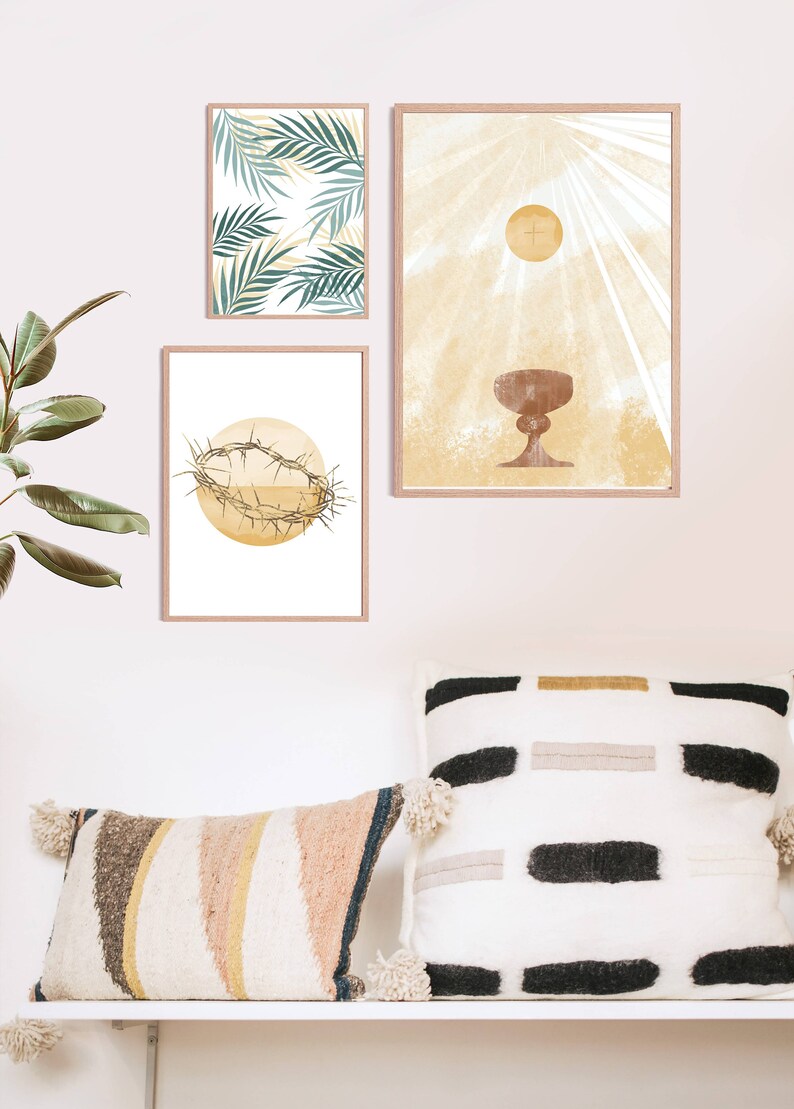 May include: Three framed prints with religious imagery. The first print features a crown of thorns, the second print features a chalice, and the third print features palm leaves.