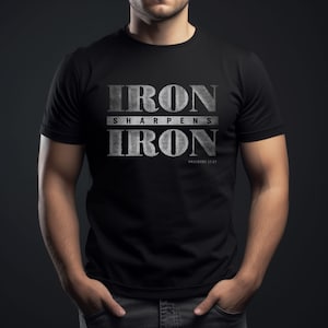 Iron Sharpens Iron Christian Bible Verse Distressed Graphic T Shirt (Black)