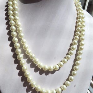 Vintage long hand knotted  white faux Pearl necklace - elegant