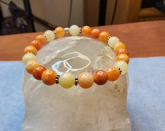 Calcite- yellow and orange calcite with sterling silver stars.  8mm stretch bracelet