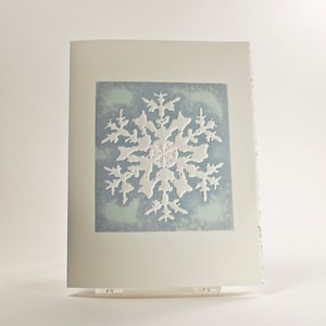 Carte de flocon de neige des montagnes Rocheuses. Carte de vœux typographique. Paquet de 6 cartes ou une carte. Vierge ou voeux de fin d'année à l'intérieur.