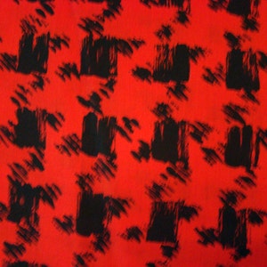 May include: Red fabric with a black abstract pattern. The pattern is made up of repeated shapes that resemble brushstrokes.