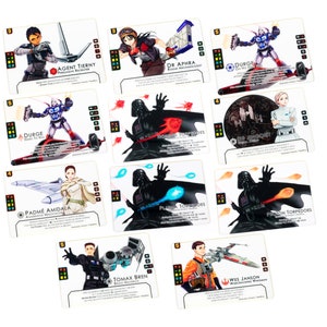 May include: A set of 10 trading cards featuring characters from the Star Wars universe. The cards are white with black borders and feature colourful illustrations of the characters. The characters include Darth Vader, Padme Amidala, Agent Tern, Durge, and more.