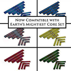 May include: Image features various sets of game pieces in blue, black, red, yellow, and green. Each set includes long, rectangular pieces and smaller, angled pieces. The text "NOW COMPATIBLE WITH EARTH'S MIGHTIEST CORE SET" is displayed in a central banner.