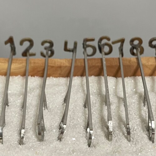 10 fers à marquer : mini-ensemble de fers (0-9)