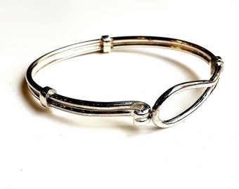 Silver bracelet, rigid, closed looped