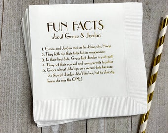 May include: White paper napkin with gold text that reads "FUN FACTS about Grace & Jordan" and lists five fun facts about the couple.