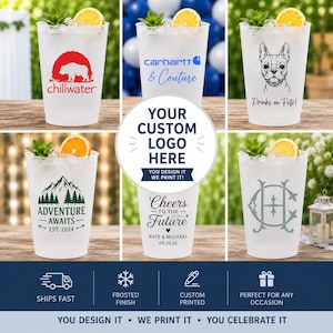 May include: A collection of six frosted plastic cups, each filled with ice and a lemon slice, featuring various custom printed designs including a bear, a dog, mountain scenery, and text such as "Cheers to the Future" and "Adventure Awaits."