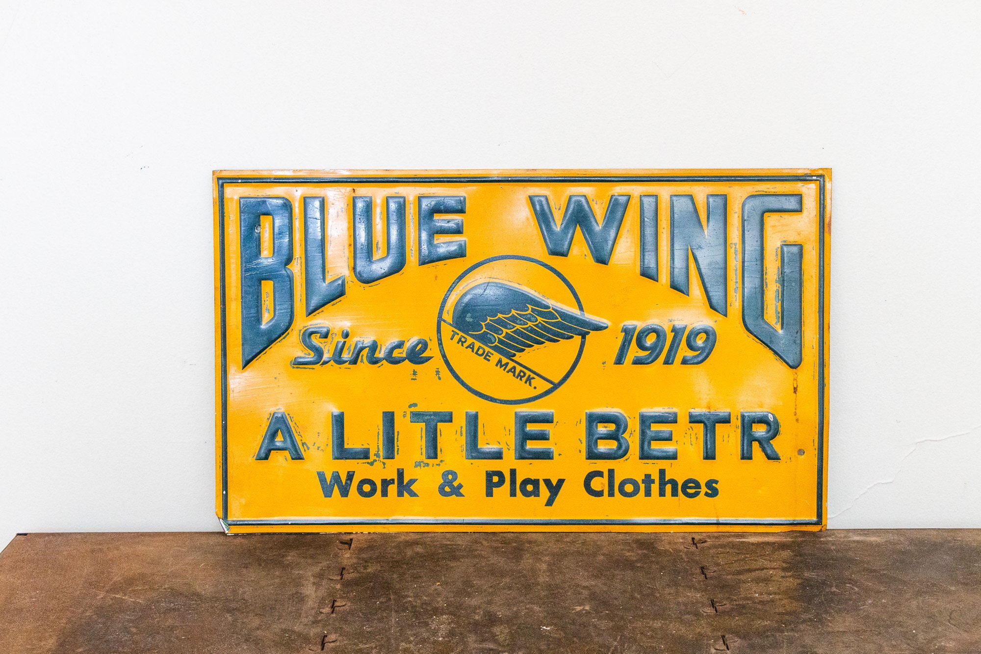 Blue Wing Clothing Sign Vintage Tin Advertising Signage Wall Decor - Etsy, image size:2000x1333
