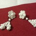 White screw back earrings