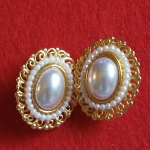 Oblong Pearl with tiny Pearls all around set in Gold Tone, Light weight Clip on Earrings