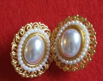 Oblong Pearl with tiny Pearls all around set in Gold Tone, Light weight Clip on Earrings