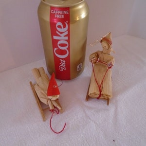 Corn Husk Doll&#39;s on sleds
