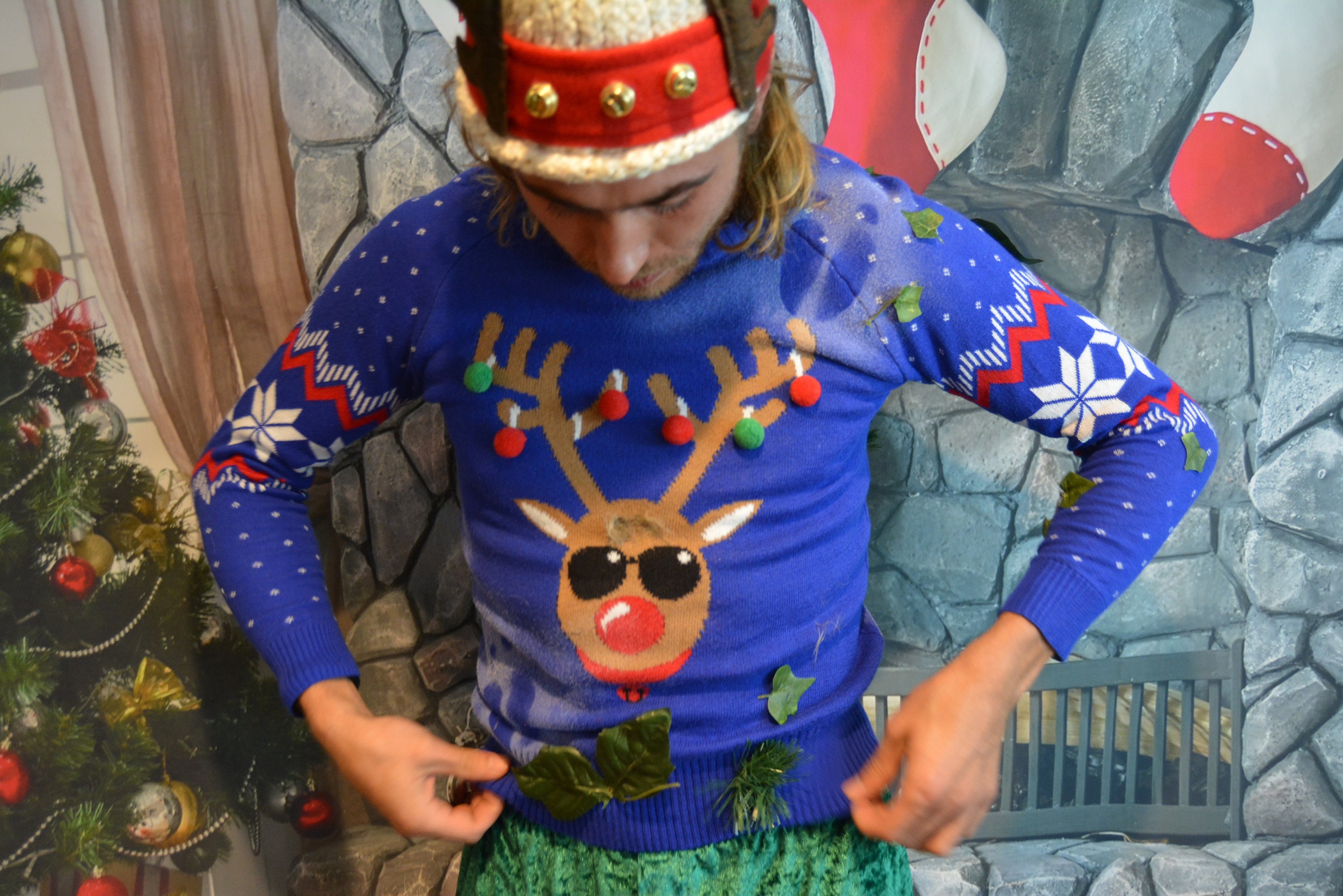 Reindeer nipple christmas best sale sweater