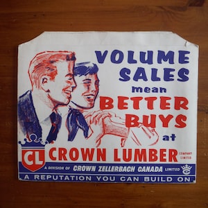 May include: A vintage advertisement for Crown Lumber, a division of Crown Zellerbach Canada Limited. The ad features two men in suits, with the text "Volume Sales mean Better Buys at Crown Lumber. A reputation you can build on."