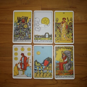 May include: Six tarot cards arranged in two rows. Top row: King of Pentacles, Ace of Pentacles, Nine of Pentacles. Bottom row: Six of Pentacles, Eight of Cups, Queen of Pentacles. Each card features colorful illustrations with gold pentacle symbols.