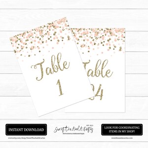 May include: Two printable table number cards with a pink and gold confetti design. The text "Table" and the table numbers "1" and "24" are in gold glitter font.