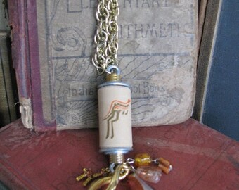 glass beads Wine Cork Pendant with Grape Leaf Motif embellished with nail heads and repurposed chain tassel.