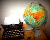 Marked Down///Vintage 12 inch Sculptural Relief Globe on Metal Stand, Rotates and Spins Great Condition