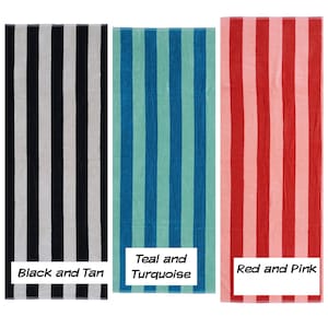 May include: Three striped beach towels in black and tan, teal and turquoise, and red and pink. Each towel has vertical stripes and a rectangular shape. The text "Black and Tan", "Teal and Turquoise", and "Red and Pink" are in white boxes.
