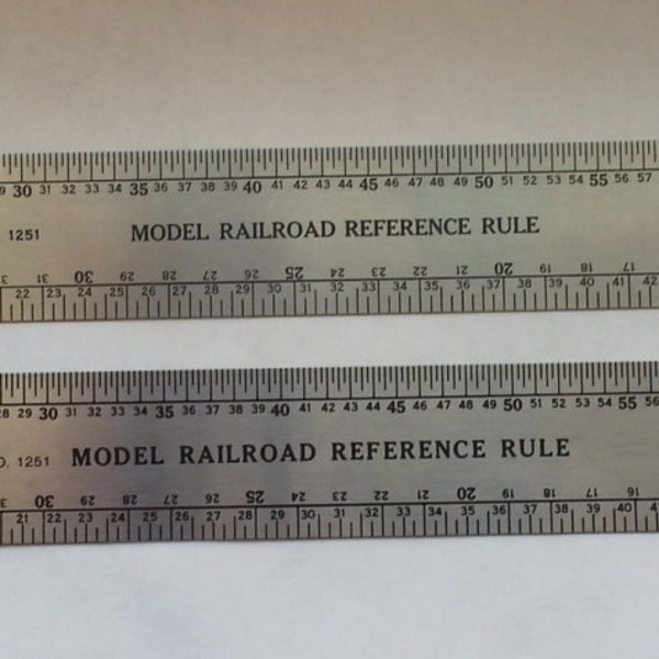 Two (2) General Industrial Precision 12 In. Flexible Steel Rules with Model Railroad Graduations, No. 1251. HO, S, O and N Gauges