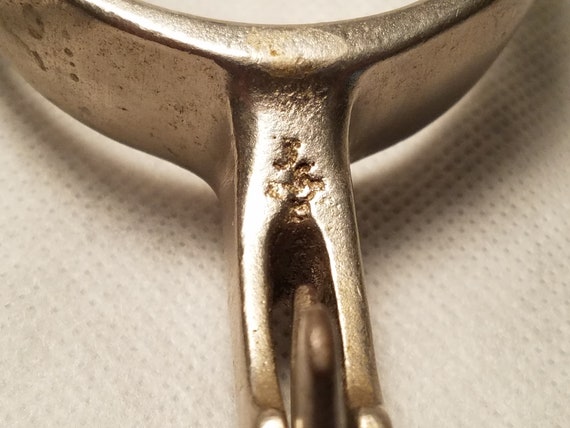 Pair of Marked North and Judd Spurs with 5 Point Star Rowels with Straps