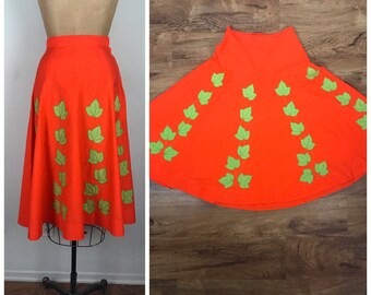 Vintage 1950s 50s 1960s 60s pumpkin orange with leaf appliqués skirt