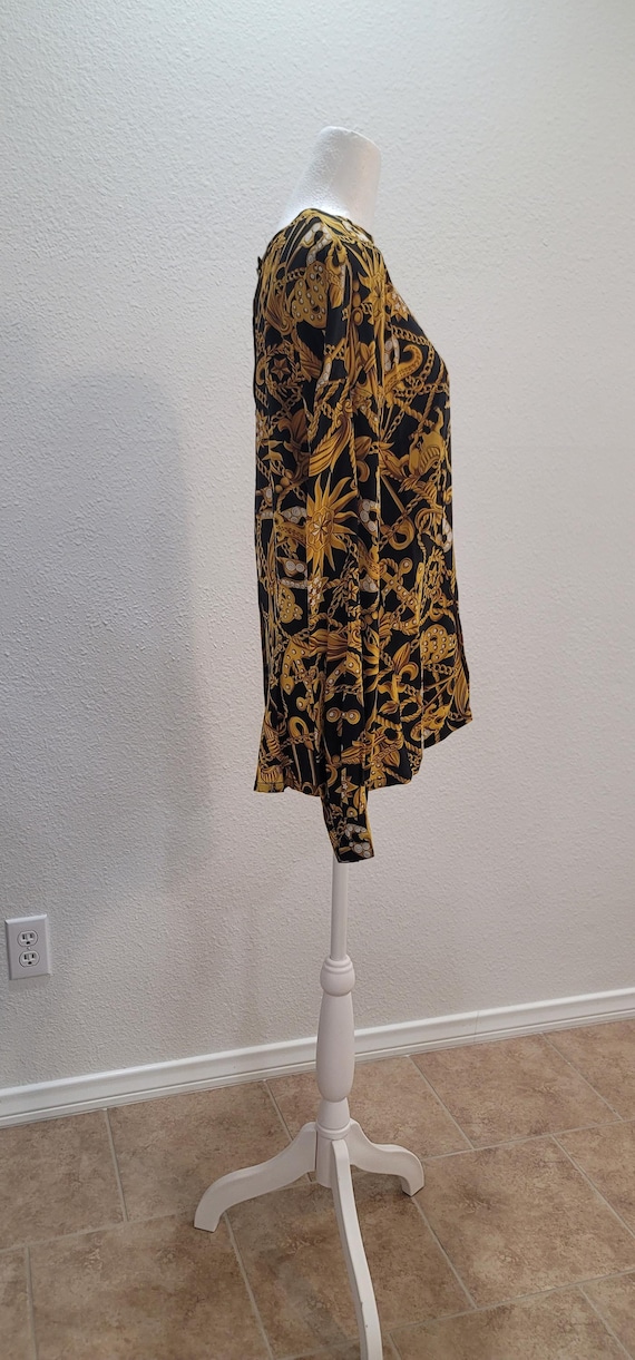 Fun blouse that buttons up in the back. - image 3