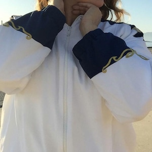 White Windbreaker