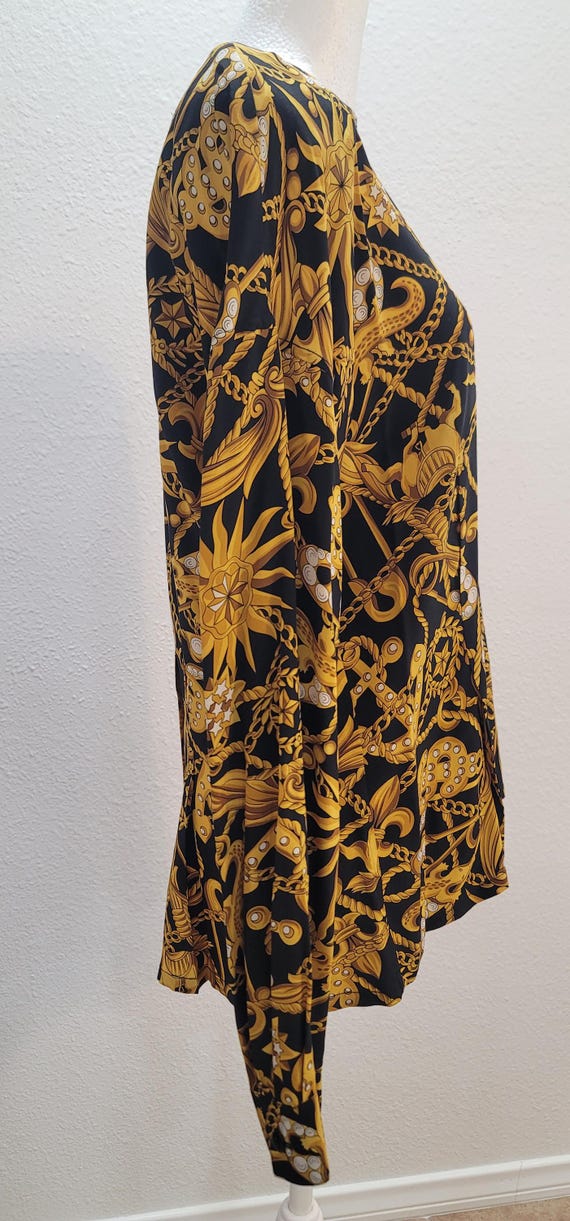 Fun blouse that buttons up in the back. - image 4