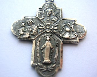 Stary wisiorek/medal ze srebra próby 925. Jestem katolikiem. Proszę o wezwanie księdza. Waga: 3,2 grama.