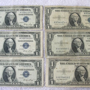 Six 1935 Series  1.00 Dollar Silver Certificate, Blue Seal, Narrow Margin, Circulated Lot # 1